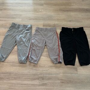Three pairs of baseball pants, grey, black. Rawlings